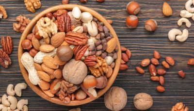 Assortment,Of,Nuts,In,Bowls.,Cashews,,Hazelnuts,,Walnuts,,Pistachios,,Pecans,